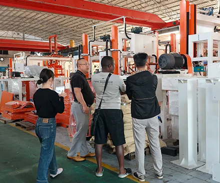 Customers in Burundi, Africa, inspect lightweight block production line.